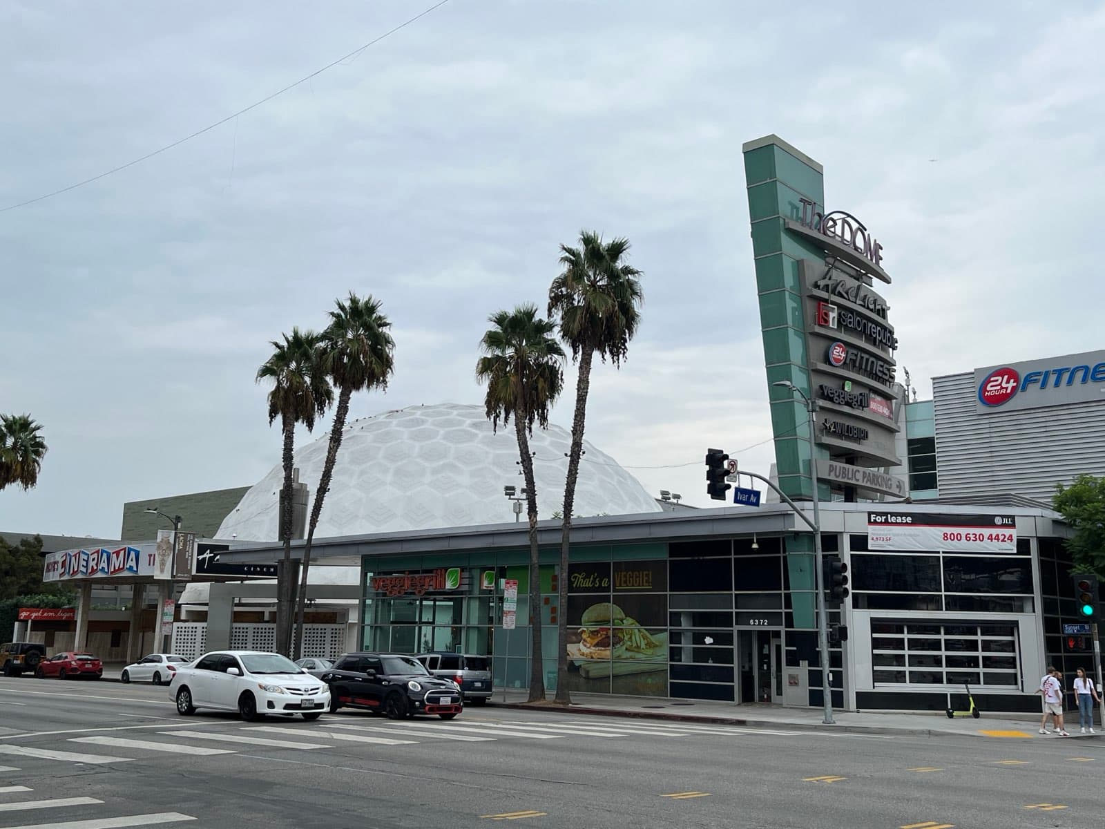 The closed ArcLight Hollywood complex on Sunset Boulevard in September 2022, with the dark ArcLight sign tower and the white Cinerama Dome behind it